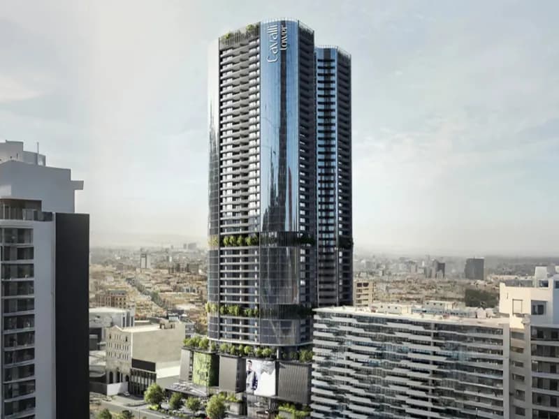 Cavalli Tower high-rise above a dense city skyline
